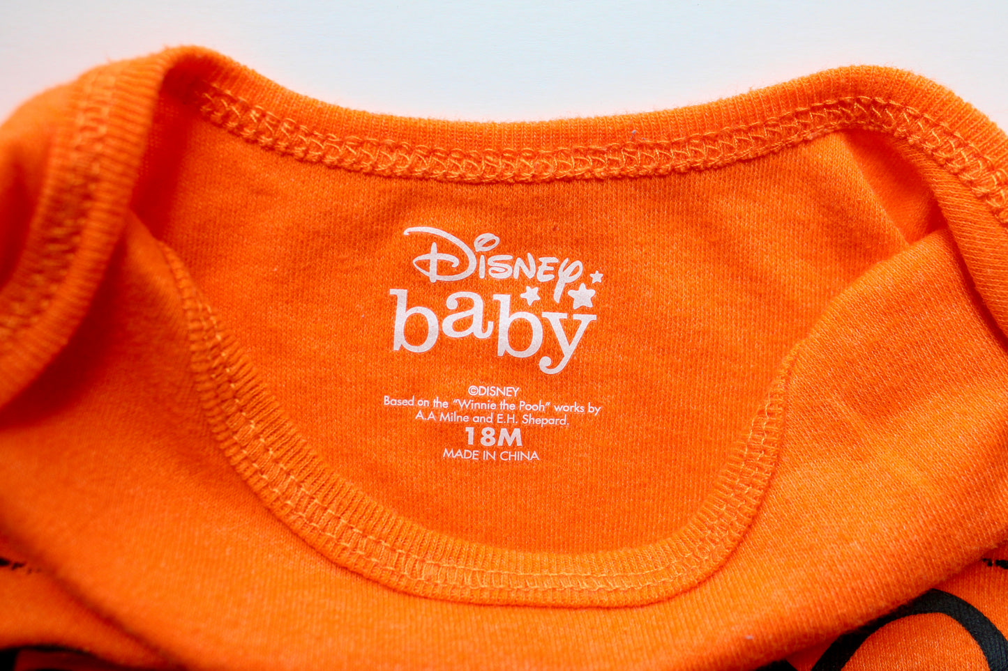 Orange Tigger onesie - 18m