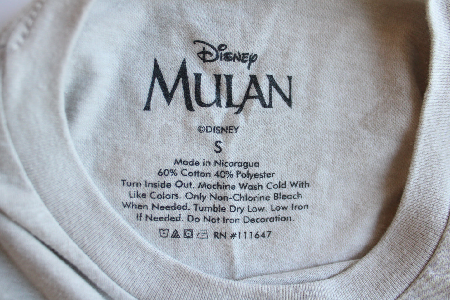 Light tan Mulan tee - size S